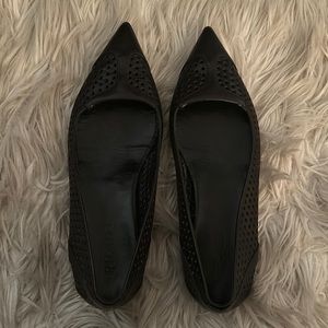 Black Prada flats